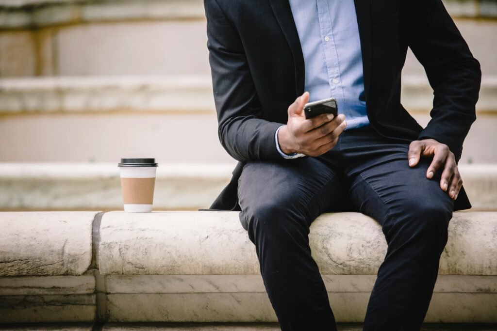 Man using smartphone for mobile data connection