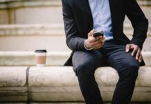 Airtel Data Loan Code 2025: How to Borrow Data Instantly Man using smartphone for mobile data connection