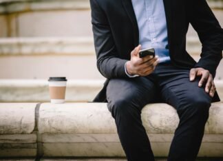 Airtel Data Loan Code 2025: How to Borrow Data Instantly Man using smartphone for mobile data connection